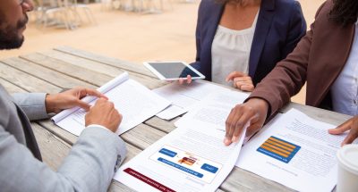 Legal experts reviewing customer documents